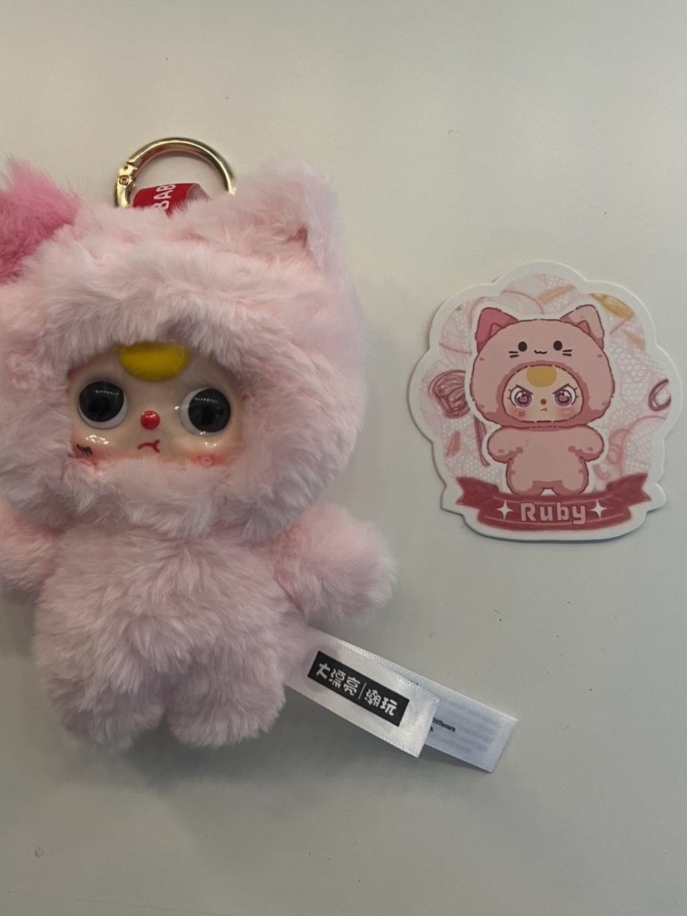 Pink baby three keychain